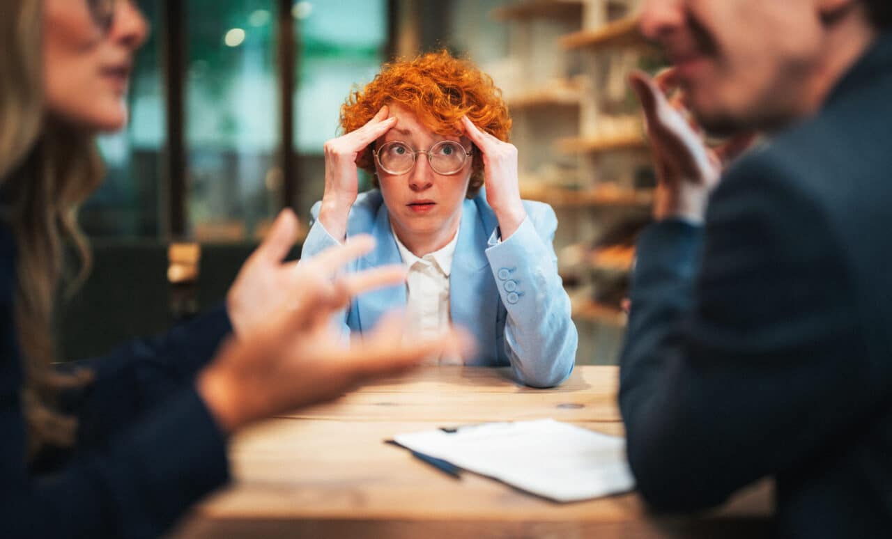 Woman feels confused during a conversation. This may be due to undiagnosed hearing difficulties.